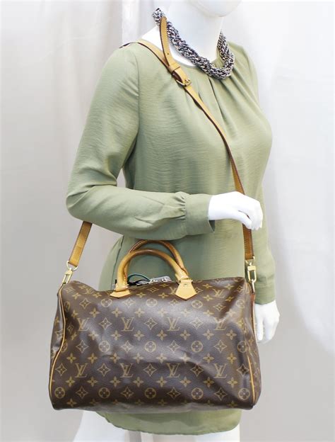 louis vuitton speedy bandouliere 35 whith charm|louis vuitton speedy 35 monogram.